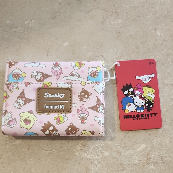 Loungefly Handbags - Loungefly Sanrio Hello Kitty Wallet. NWT.  5×4